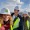 a group of people wearing construction  hats