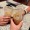 a group of people with coffee cups