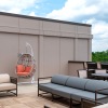 rooftop with a couch and chairs