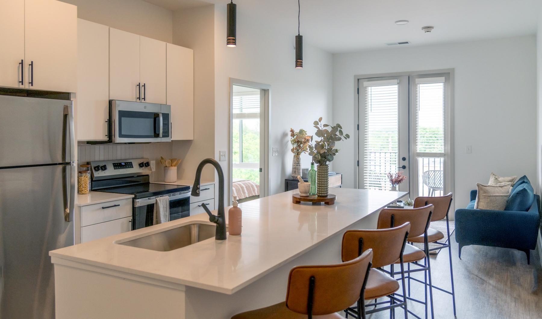 a kitchen with a dining table